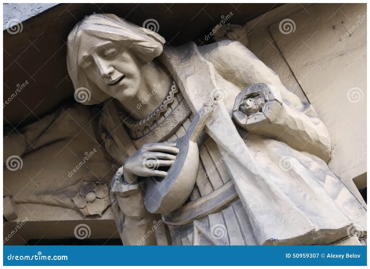 Sculpture of bard playing the lute in prague stock of