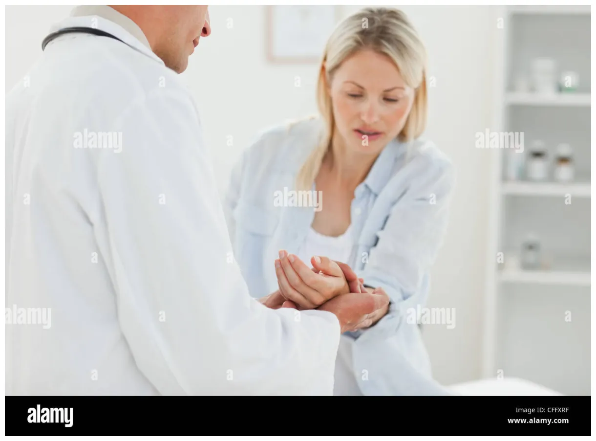 Doctor checking his patients pulse Stock Photo - Alamy
