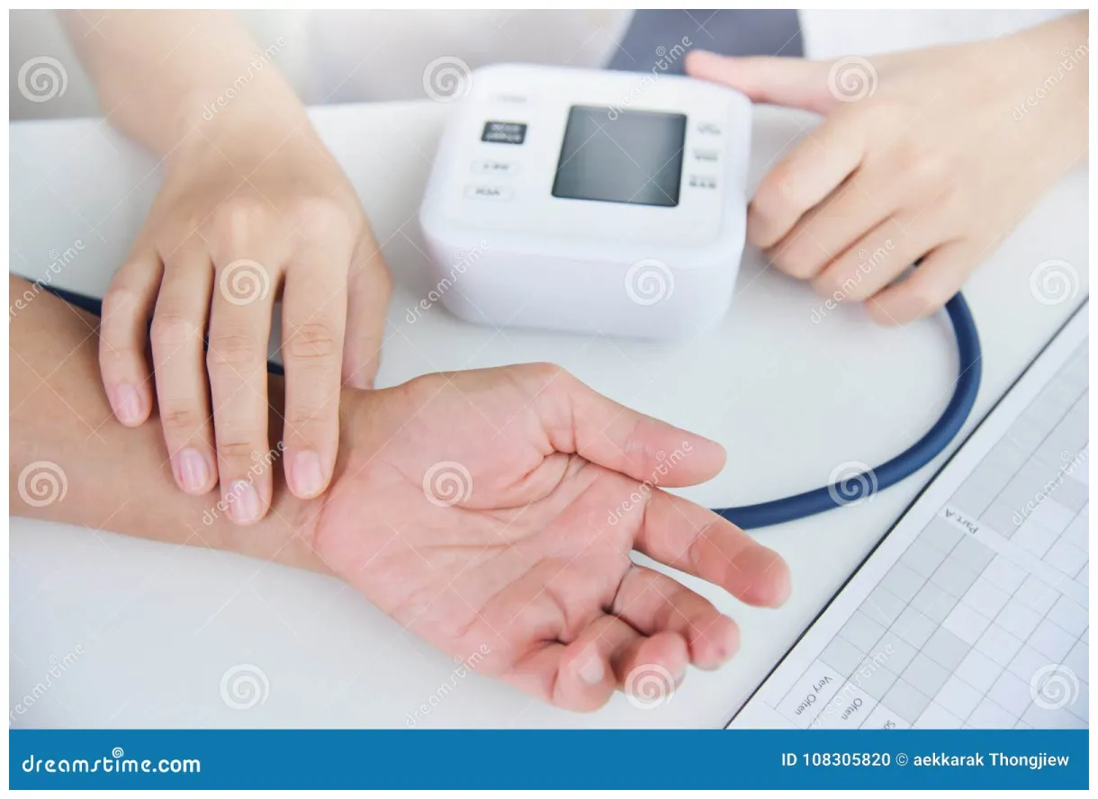 Female Doctor Checking Patient Pulse. Stock Photo - Image of