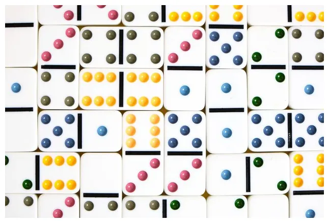 Premium Photo | Dominoes with colorful coloring on a white background