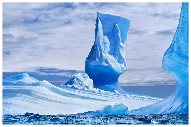 Awesome glacier icebergs in antarctica moving, colliding, falling