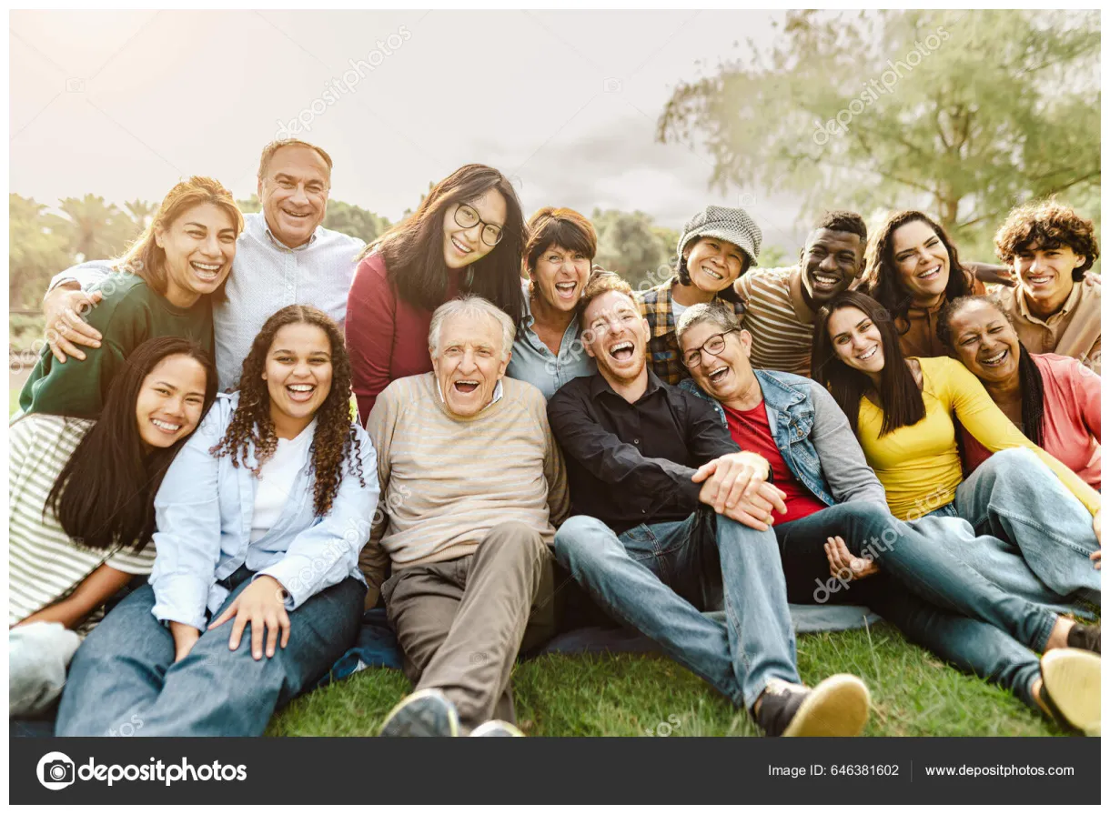 Happy multigenerational people having fun sitting grass public park