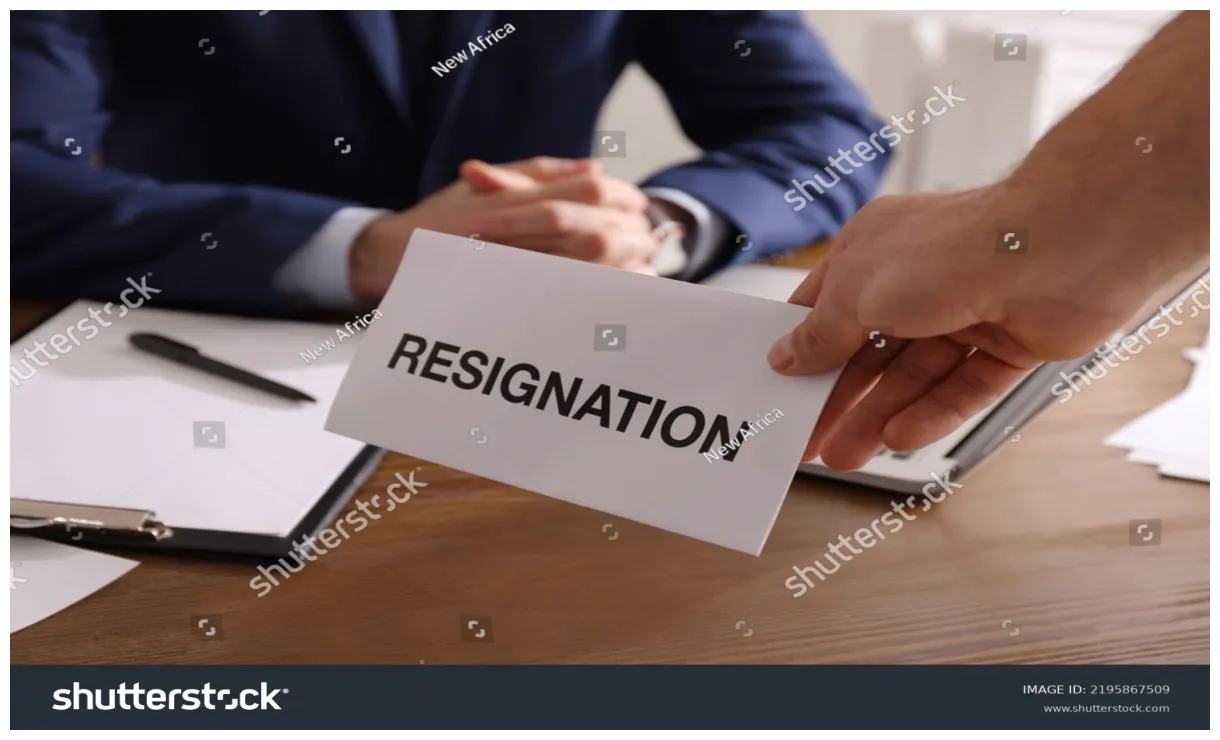 Employee giving resignation letter boss office 2195867509