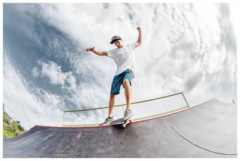 Skateboarder doing trick on ramp of adult, jump