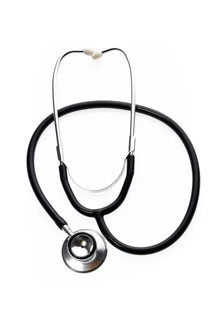 Premium close-up of stethoscope over white