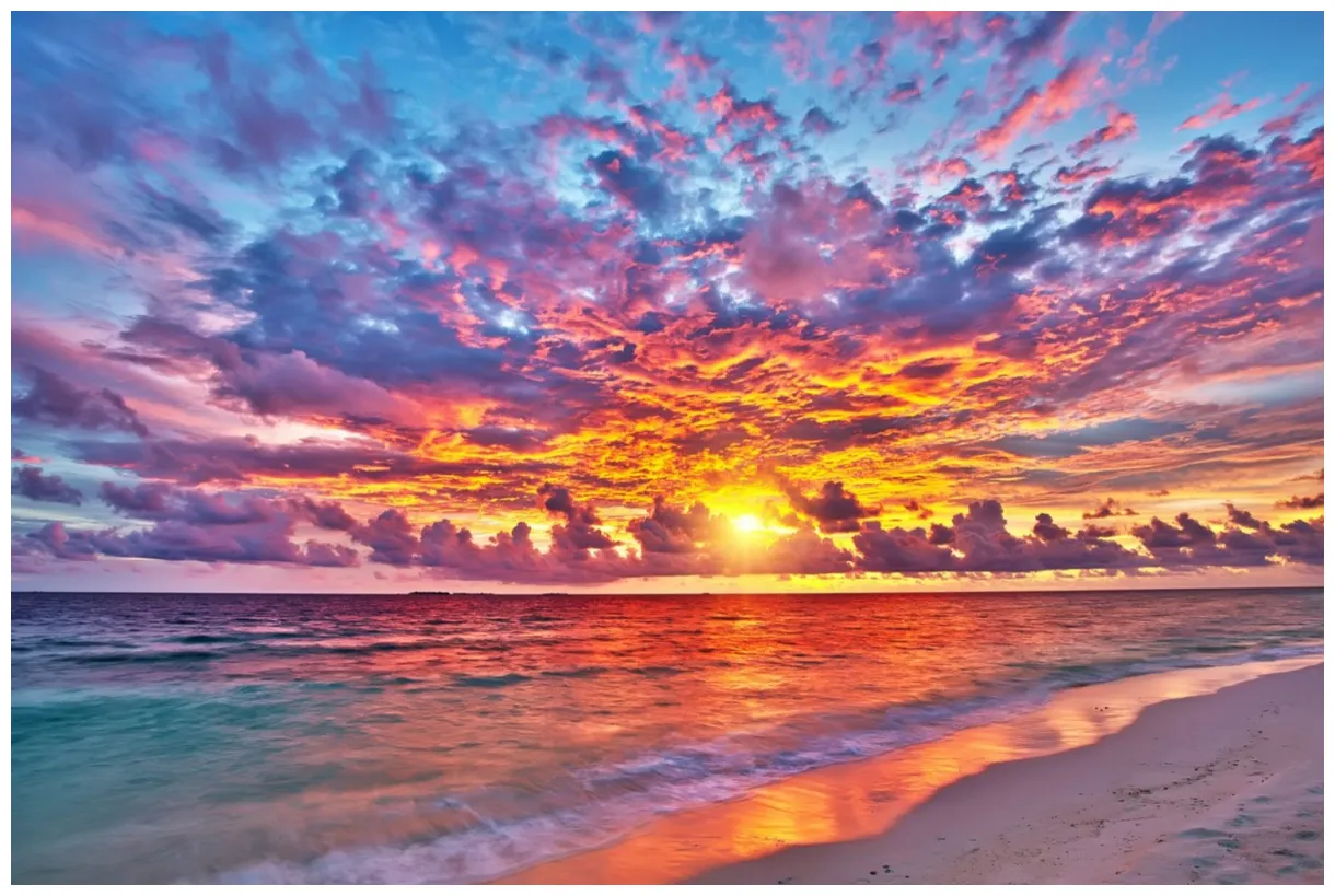 What is the symbolic significance of a colorful sunrise or sunset