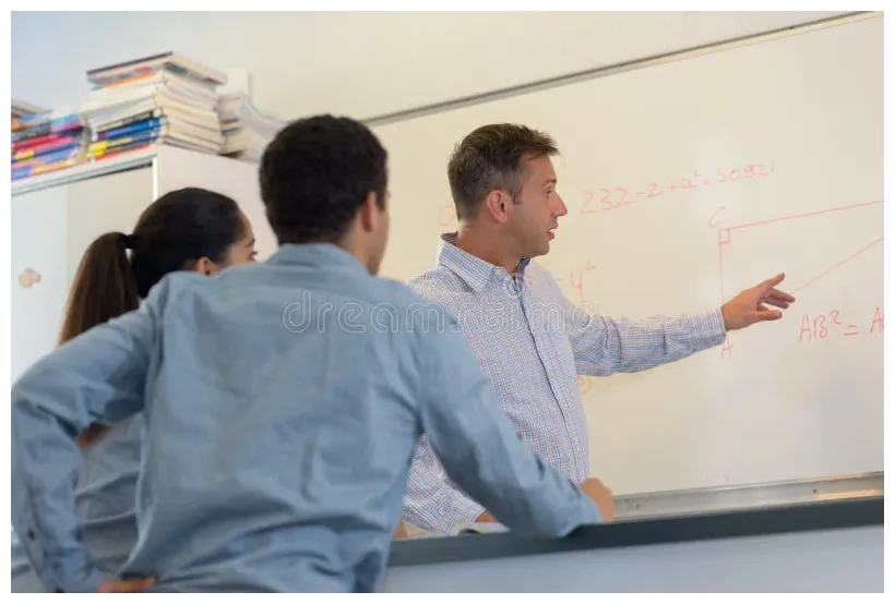 Teacher and student pointing to board of attention