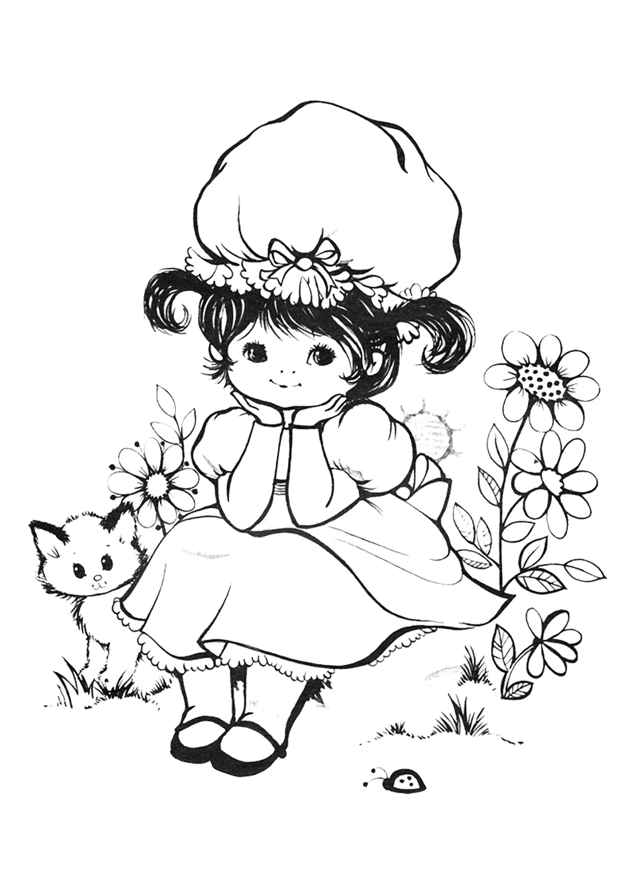 Of a little girl in the garden with her cat